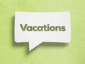 White chat bubble and Vacations text