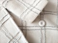 White checkered coat and buttons Royalty Free Stock Photo