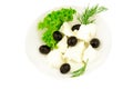 White cheese feta with black olive and fresh salad, dill in plat