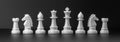 White chess figures isolated on the black background. Royalty Free Stock Photo