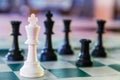 White chess king surrounded Royalty Free Stock Photo