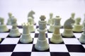 White chess pieces on board Royalty Free Stock Photo