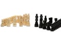 White chess pieces in front of black chess pieces