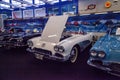 White 1960 Chevrolet corvette convertible displayed at the Muscle Car City museum