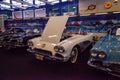 White 1960 Chevrolet corvette convertible displayed at the Muscle Car City museum