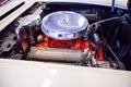 White 1960 Chevrolet corvette convertible displayed at the Muscle Car City museum