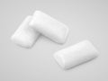 White chewing gums on gray Royalty Free Stock Photo