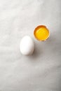 White chicken egg with one egg yolk Royalty Free Stock Photo