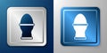 White Chicken egg on a stand icon isolated on blue and grey background. Silver and blue square button. Vector Royalty Free Stock Photo