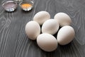 White chicken eggs and color dyes on a gray table. Celebrating E Royalty Free Stock Photo