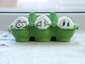 Funny Easter eggs with sad and funny faces