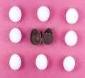 white chicken eggs with open chocolate egg table. High quality photo Royalty Free Stock Photo