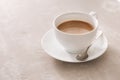 White china cup of tea with milk on a plain background Royalty Free Stock Photo