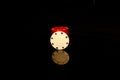 White chips stack with a red chip in front isolated on black with reflection Royalty Free Stock Photo