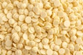 White chocolate chips or granules background, top view. Royalty Free Stock Photo