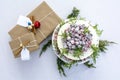 White Chocolate Cranberry Cake with gift boxes on table cloth