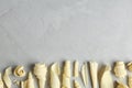 White chocolate curls and space for text on gray background Royalty Free Stock Photo