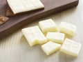 Pure Decadence: Exquisite White Chocolate Showcased on a Wholesome Table Display Royalty Free Stock Photo