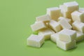 White chocolate in a green background Royalty Free Stock Photo