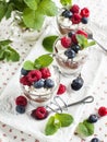 White chocolate and milk chocolate mousse with berries and meringue Royalty Free Stock Photo