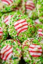 White chocolate peppermint kisses cookies decorated with Christmas holiday sprinkles and jimmies. Portrait orientation Royalty Free Stock Photo
