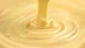 White Chocolate. Pouring melted liquid premium milk white chocolate. Close up of molten liquid hot chocolate swirl Royalty Free Stock Photo