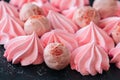 White chocolate strawberry truffles and pink meringue kisses on Royalty Free Stock Photo