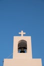 White Christian belfry with orthodox cross on a church against blue sky. Faith and religion temple Royalty Free Stock Photo