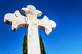 White christian cross and blue sky Royalty Free Stock Photo