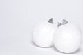 White Christmas backdrop with three christmas balls