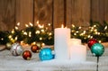 White Christmas candles and holiday decorations Royalty Free Stock Photo