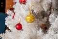 White Christmas decoration with balls on fir branches with blurred background. christmas tree with colorful decoration Royalty Free Stock Photo