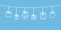 White christmas decorations hanging blue background