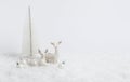 White Christmas greeting card. Two deer in snow on white background with balls and Christmas tree. Monochrome winter Royalty Free Stock Photo