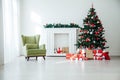 White Christmas home interior Christmas tree red gifts new year decor festive background Royalty Free Stock Photo