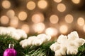 White Christmas snowflakes background defocused yellow lights. Royalty Free Stock Photo