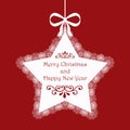 White Christmas star hanging against a red background Royalty Free Stock Photo