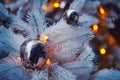 White christmas tree decorated with toys and golden balls. Preparing to celebrate the new year and christmas Royalty Free Stock Photo