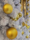 White Christmas tree decoration, closed up ornaments and hanging disco and golden ball with silver tinsel Royalty Free Stock Photo