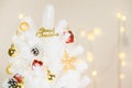 White Christmas tree decoration with Gold snowflake and ball pin Royalty Free Stock Photo