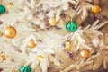 White Christmas tree with gold and green baubbles, close up Royalty Free Stock Photo