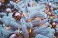 White christmas tree with golden balls, xmas decorations on new year