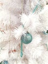 White Christmas tree with green toy. Unusual Christmas tree for the new year and Christmas. Beautiful tree Royalty Free Stock Photo