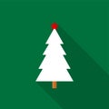 White Christmas tree icon with a red star and long shadow on green background. Royalty Free Stock Photo