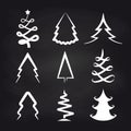 White christmas tree icons on chalkboard