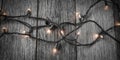 White Christmas Tree Lights on Rustic Wood Background Royalty Free Stock Photo