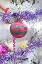 White Christmas tree red ball ornament silver glitter stripes Royalty Free Stock Photo