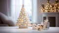 White Christmas Tree on the Table with Small Gifts