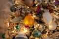 White Christmas tree with vintage toys, balls, garlands on a spruce branches with artificial snow, copy space Royalty Free Stock Photo