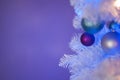 White Christmas tree with white light, blue light, purple ornament, turquois ornament and white ornament Royalty Free Stock Photo